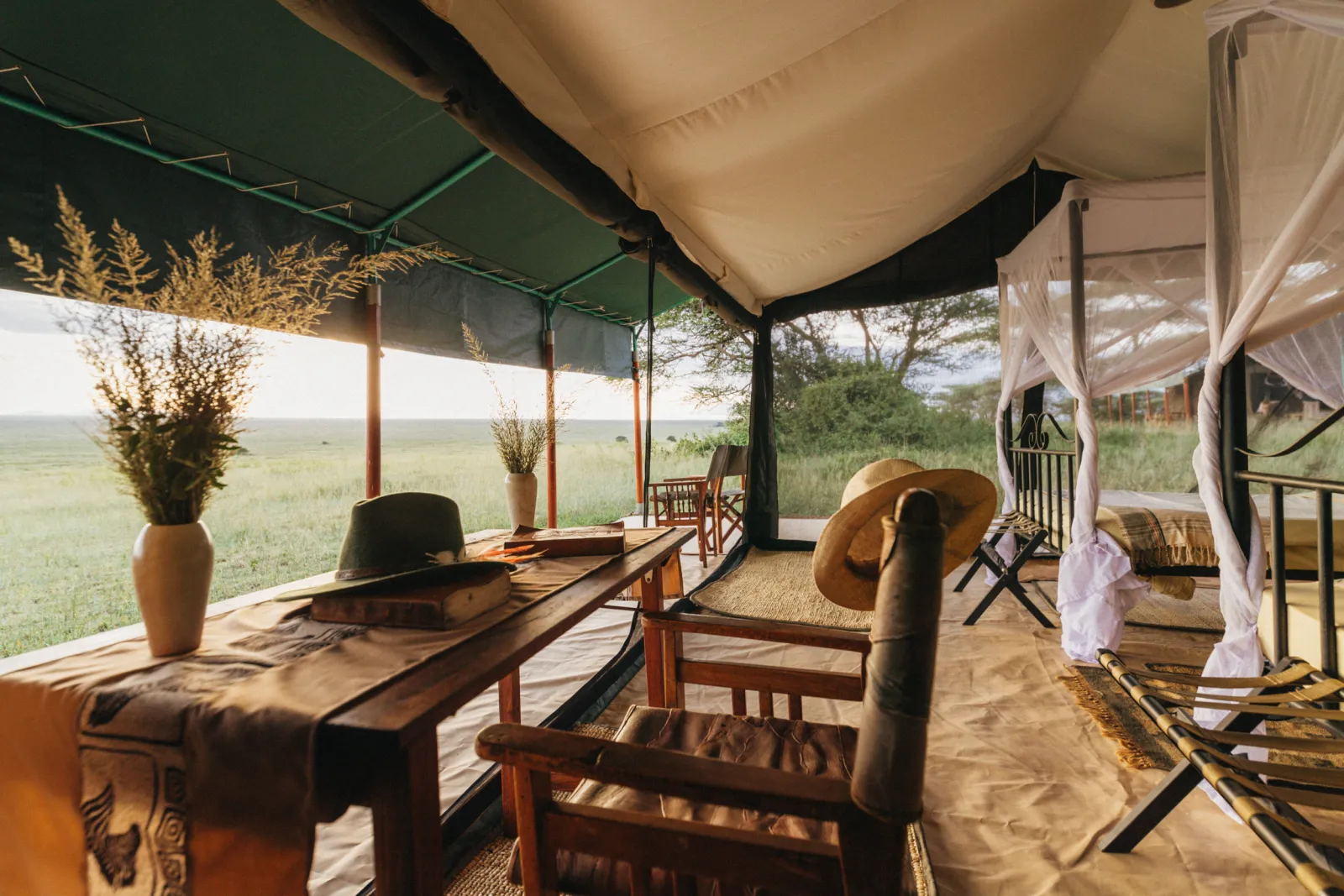 The veranda of a Serengeti camp tent, open to the plains